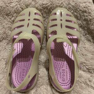 White crocs with Lavendar Interior.